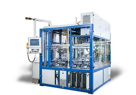 Fully enclosed custom AWM machine featuring transparent safety glass, a swivel-arm operator panel, and integrated ventilation and control systems.